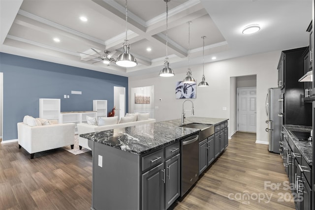 18568 Mainsail Ct, Lancaster, SC 29720 - kitchen with appliances with stainless steel finishes, a center island with sink, a ceiling fan, dark wood-style flooring, and coffered ceiling