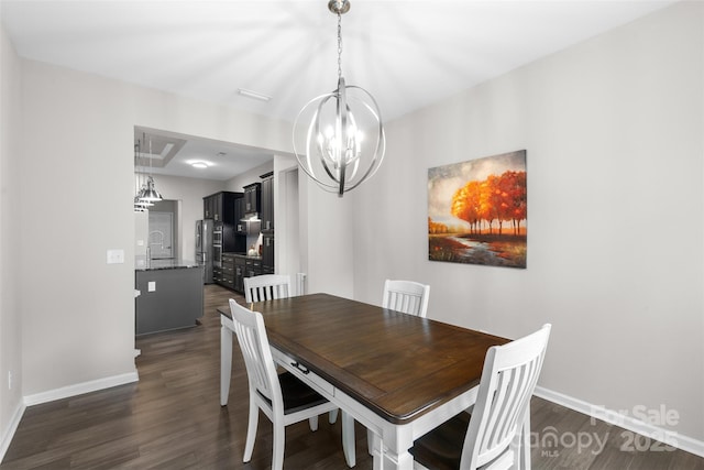 18568 Mainsail Ct, Lancaster, SC 29720 - dining space featuring a chandelier and dark wood-type flooring