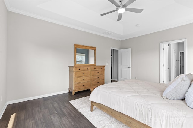 18568 Mainsail Ct, Lancaster, SC 29720 - bedroom with dark wood finished floors, a tray ceiling, crown molding, and a ceiling fan