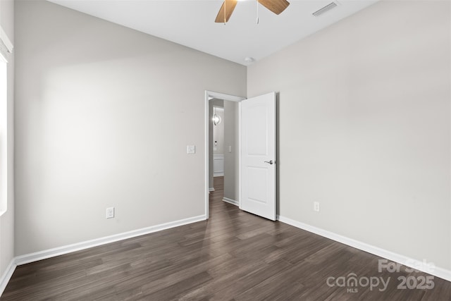18568 Mainsail Ct, Lancaster, SC 29720 - empty room with a ceiling fan and dark wood finished floors