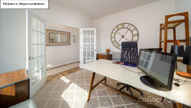 119 Rustling Waters Dr, Mooresville, NC 28117 - office area featuring french doors and wood finished floors
