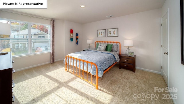 119 Rustling Waters Dr, Mooresville, NC 28117 - carpeted bedroom featuring multiple windows and recessed lighting