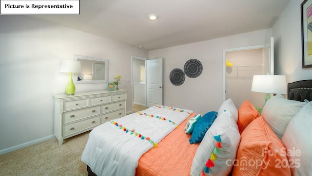 119 Rustling Waters Dr, Mooresville, NC 28117 - bedroom featuring light carpet, a spacious closet, and recessed lighting