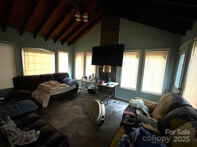 407 Alton St, Monroe, NC 28110 - living area with carpet floors, beamed ceiling, and high vaulted ceiling