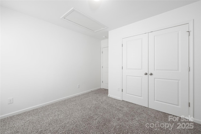 12548 Gotland Rd Unit 327, Midland, NC 28107 - unfurnished bedroom with carpet, a closet, and attic access