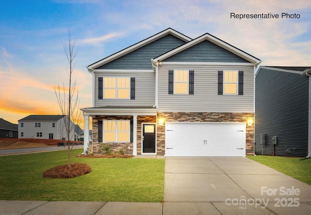 115 Rustling Waters Dr, Mooresville, NC 28117 - craftsman-style house with stone siding, driveway, a yard, and an attached garage