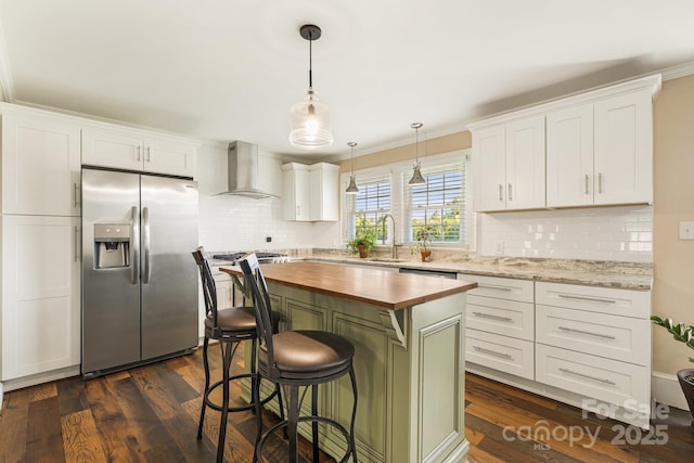 268 Oakland Rd, Spindale, NC 28160 - kitchen with stainless steel fridge with ice dispenser, wood counters, wall chimney range hood, backsplash, and white cabinetry