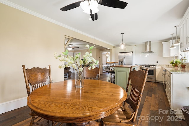 268 Oakland Rd, Spindale, NC 28160 - dining area featuring ceiling fan, dark wood-style flooring, and ornamental molding