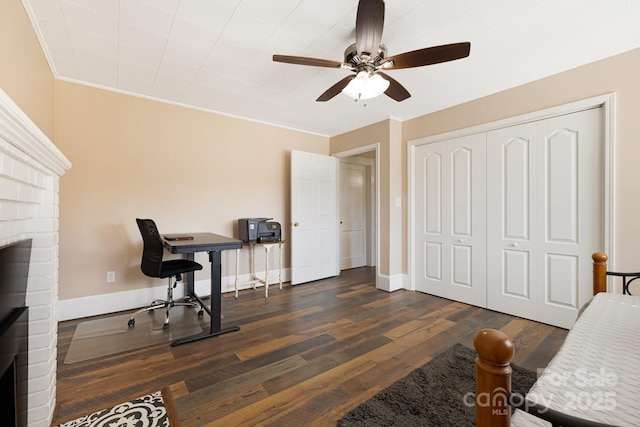 268 Oakland Rd, Spindale, NC 28160 - office area with a ceiling fan, dark wood-style flooring, and a brick fireplace