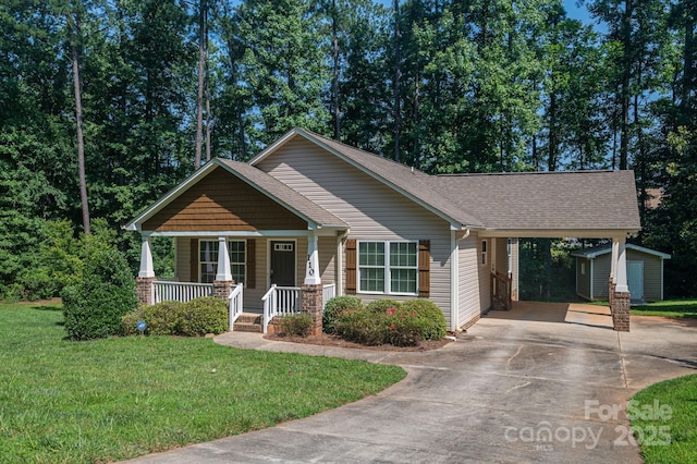 110 Leeper Ave, Belmont, NC 28012 - craftsman house featuring covered porch, a shed, driveway, a front yard, and a shingled roof