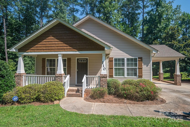 110 Leeper Ave, Belmont, NC 28012 - view of front of home featuring a porch, concrete driveway, and an attached carport