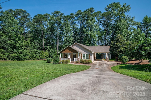 110 Leeper Ave, Belmont, NC 28012 - view of front of home with covered porch, driveway, a front yard, and an attached carport