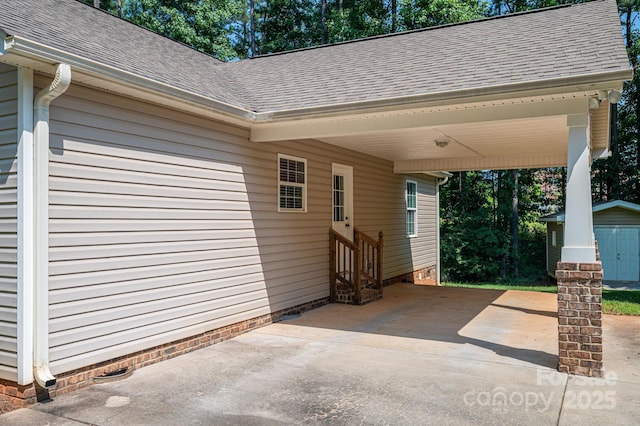 110 Leeper Ave, Belmont, NC 28012 - view of patio featuring driveway, an attached carport, a storage shed, and entry steps