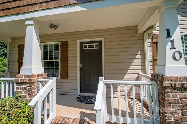 110 Leeper Ave, Belmont, NC 28012 - view of exterior entry with a porch