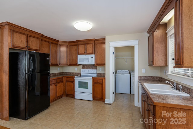 110 Leeper Ave, Belmont, NC 28012 - kitchen featuring white appliances, washing machine and clothes dryer, brown cabinets, and light tile patterned floors