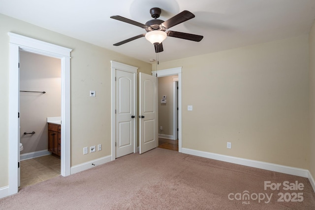 110 Leeper Ave, Belmont, NC 28012 - unfurnished bedroom with light colored carpet, ensuite bath, and ceiling fan