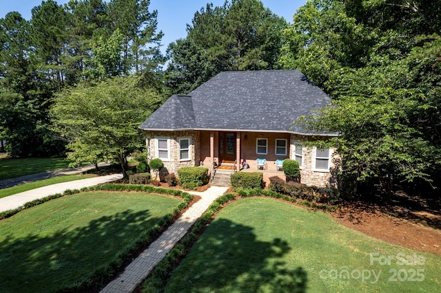 3595 Lake Bluff Dr, Sherrills Ford, NC 28673 - view of front of house featuring stone siding, a porch, and a front yard