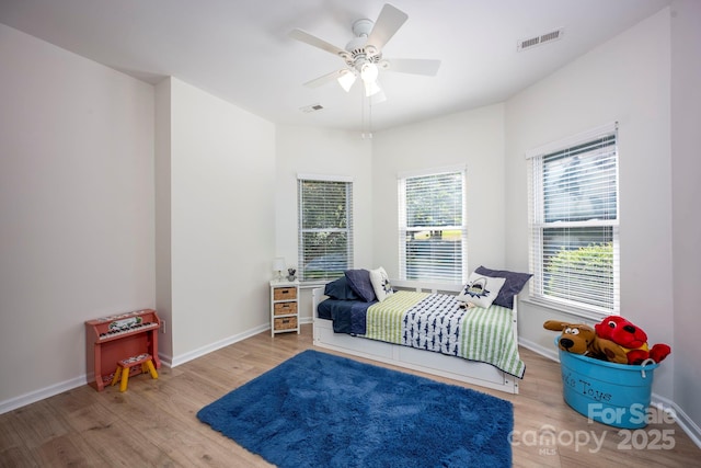 3595 Lake Bluff Dr, Sherrills Ford, NC 28673 - bedroom featuring wood finished floors and ceiling fan