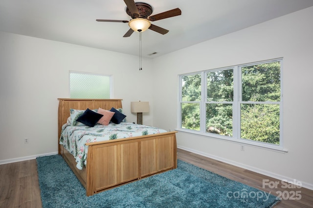3595 Lake Bluff Dr, Sherrills Ford, NC 28673 - bedroom with wood finished floors and a ceiling fan