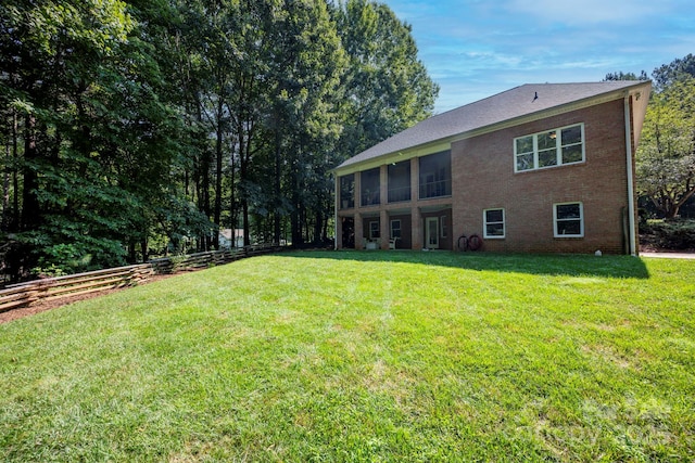 3595 Lake Bluff Dr, Sherrills Ford, NC 28673 - rear view of property featuring brick siding and a sunroom