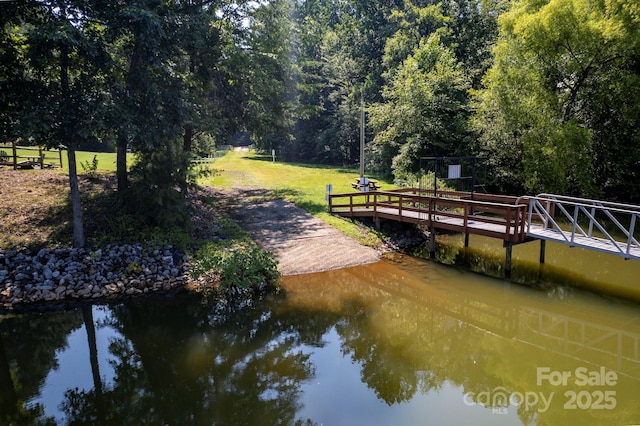 3595 Lake Bluff Dr, Sherrills Ford, NC 28673 - dock area featuring a boat ramp, a water view, and a lawn