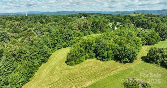 820 Suncrest Orchard Rd, North Wilkesboro, NC 28659 - drone / aerial view of a heavily wooded area and mountains