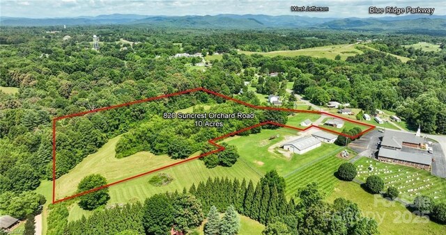 820 Suncrest Orchard Rd, North Wilkesboro, NC 28659 - aerial view of property and surrounding area featuring property boundaries highlighted