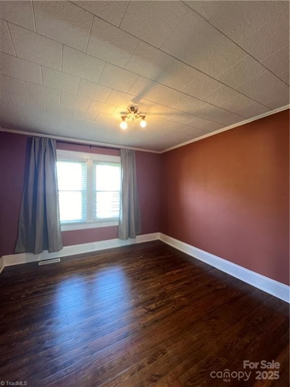 820 Suncrest Orchard Rd, North Wilkesboro, NC 28659 - spare room with ornamental molding and dark wood finished floors