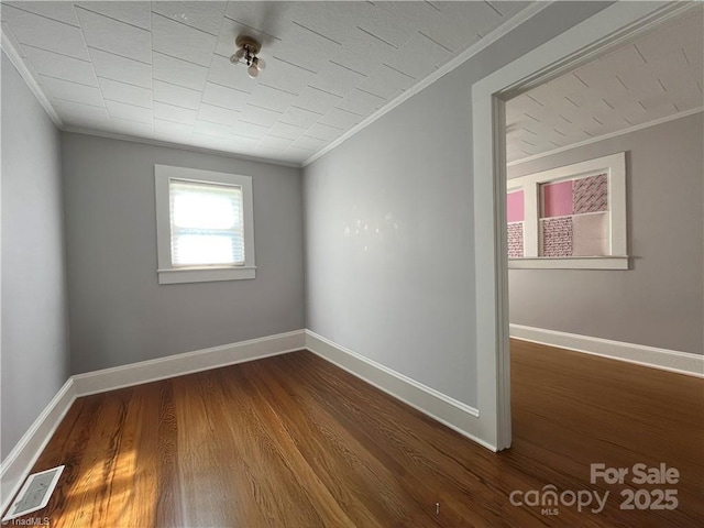 820 Suncrest Orchard Rd, North Wilkesboro, NC 28659 - empty room featuring ornamental molding and dark wood-style floors