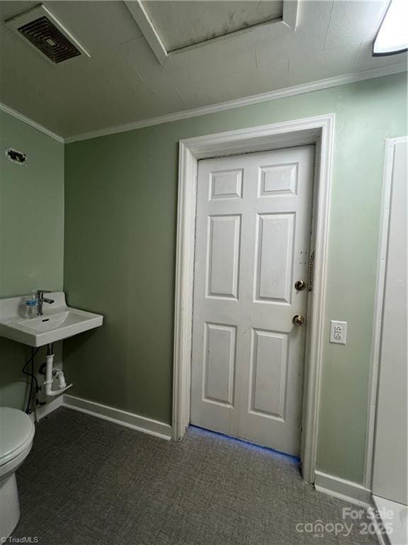 820 Suncrest Orchard Rd, North Wilkesboro, NC 28659 - bathroom featuring toilet and ornamental molding