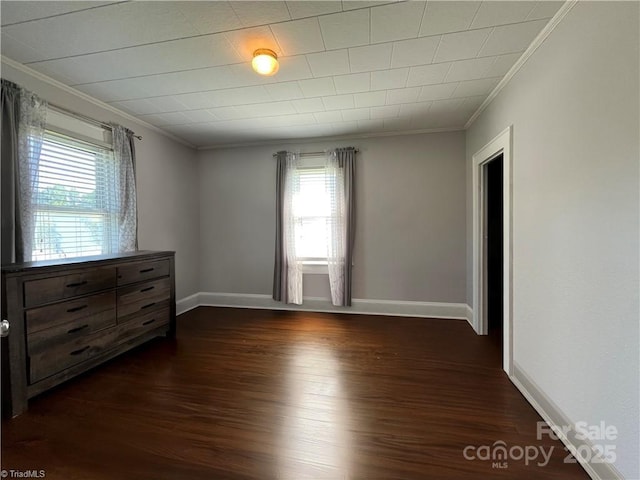 820 Suncrest Orchard Rd, North Wilkesboro, NC 28659 - empty room with crown molding, plenty of natural light, and dark wood-type flooring