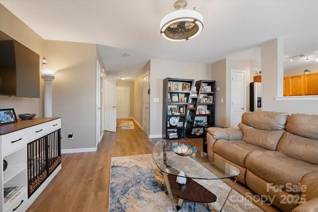 6340 Ziegler Ln Unit 148-A, Charlotte, NC 28269 - living area with light wood-type flooring and baseboards