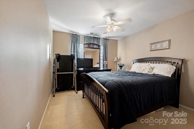 6340 Ziegler Ln Unit 148-A, Charlotte, NC 28269 - bedroom with light carpet and a ceiling fan