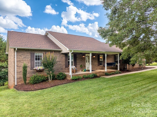 5172 Butner Dr, Hickory, NC 28602 - ranch-style house with brick siding, a front lawn, and a shingled roof
