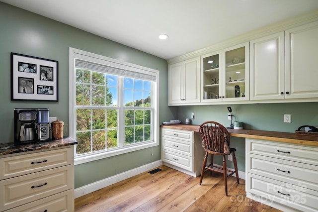 5172 Butner Dr, Hickory, NC 28602 - home office with built in study area, light wood finished floors, and recessed lighting