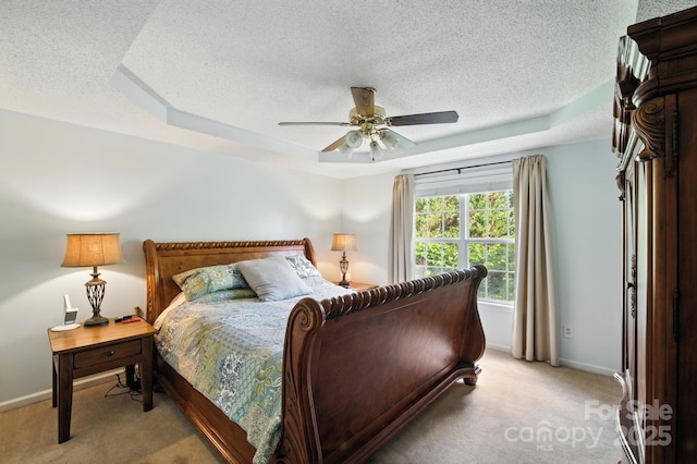5172 Butner Dr, Hickory, NC 28602 - bedroom featuring light colored carpet, a textured ceiling, a raised ceiling, and ceiling fan