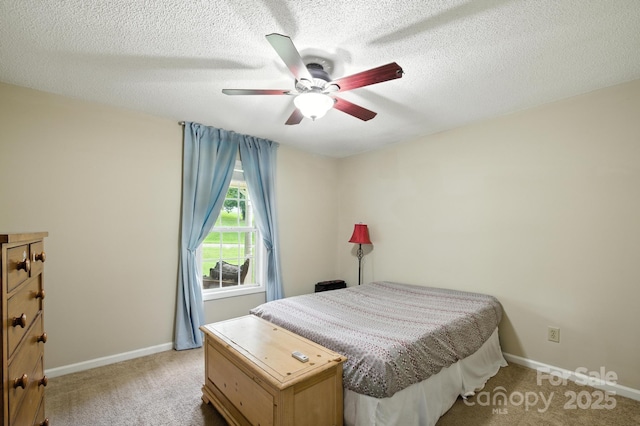 5172 Butner Dr, Hickory, NC 28602 - carpeted bedroom with a textured ceiling and a ceiling fan