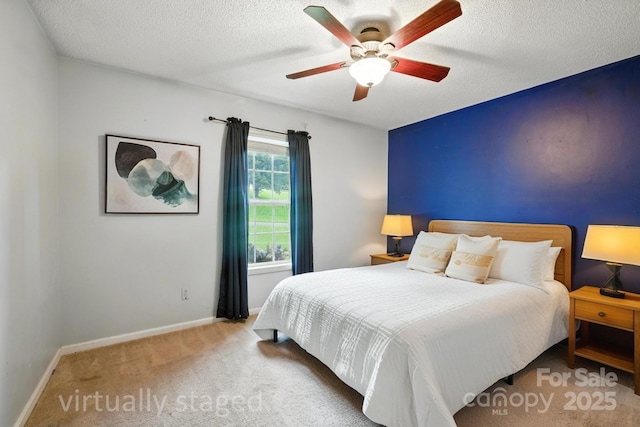 5172 Butner Dr, Hickory, NC 28602 - carpeted bedroom featuring a textured ceiling and ceiling fan