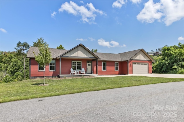 11 S Pine Dr, Weaverville, NC 28787 - ranch-style home with a garage, concrete driveway, a front lawn, covered porch, and roof with shingles