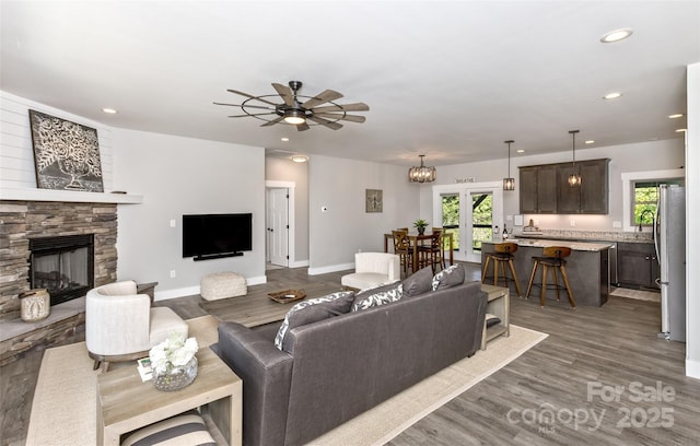 11 S Pine Dr, Weaverville, NC 28787 - living area with ceiling fan, wood finished floors, a fireplace, and recessed lighting
