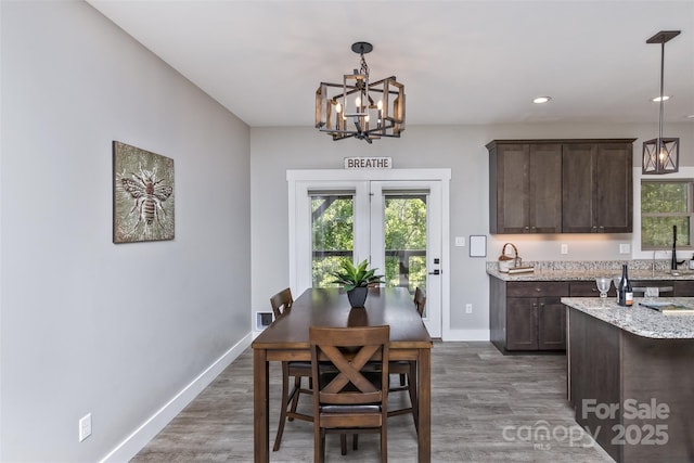 11 S Pine Dr, Weaverville, NC 28787 - dining area with a chandelier, plenty of natural light, wood finished floors, and recessed lighting