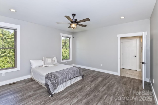 11 S Pine Dr, Weaverville, NC 28787 - bedroom with multiple windows, wood finished floors, recessed lighting, and ceiling fan