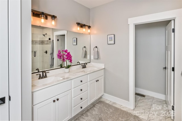 11 S Pine Dr, Weaverville, NC 28787 - full bath featuring marble finish flooring, double vanity, and a shower stall