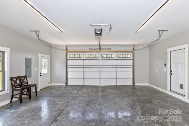 11 S Pine Dr, Weaverville, NC 28787 - garage with electric panel and a garage door opener