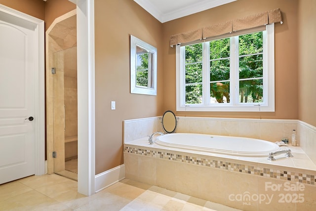114 Thurstons Way, Mooresville, NC 28117 - bathroom with tile patterned flooring, a bath, ornamental molding, and tiled shower