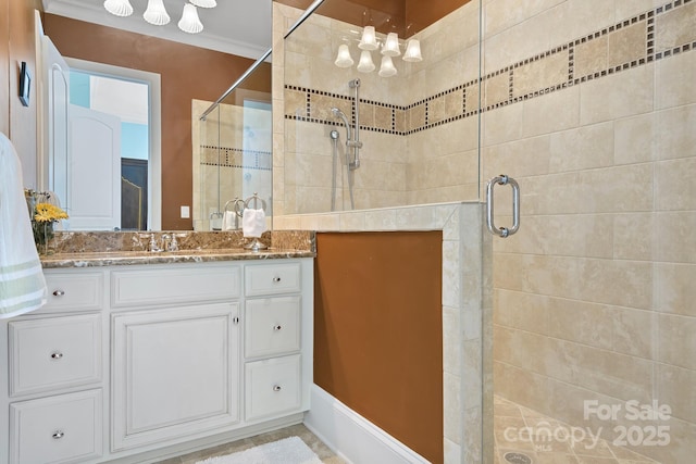 114 Thurstons Way, Mooresville, NC 28117 - bathroom featuring a shower stall, vanity, and a chandelier