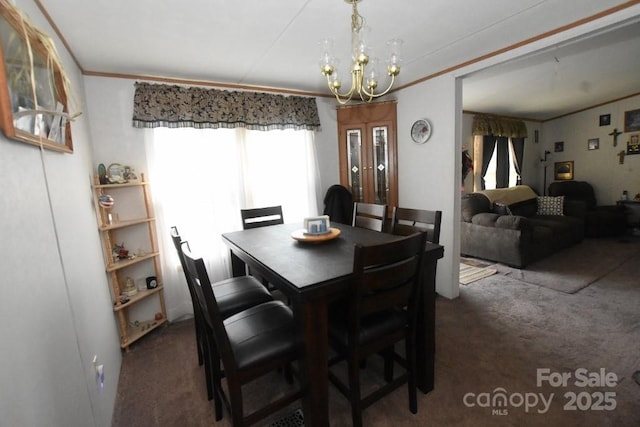 4854 Elk Ct, Morganton, NC 28655 - dining area featuring carpet floors, a chandelier, ornamental molding, and french doors