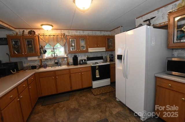 4854 Elk Ct, Morganton, NC 28655 - kitchen featuring electric range oven, white refrigerator with ice dispenser, under cabinet range hood, stainless steel microwave, and brown cabinets