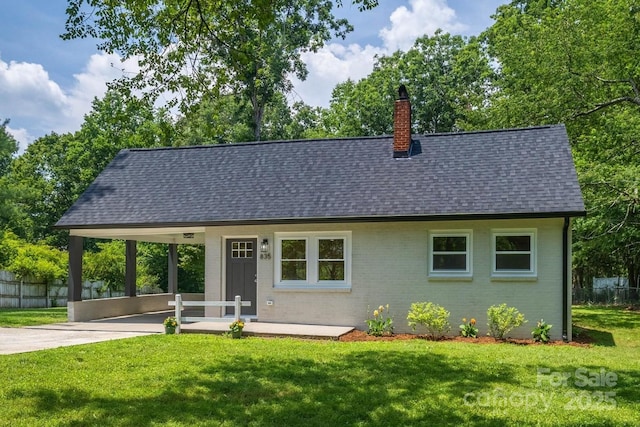 835 Vine Arden Rd, Morganton, NC 28655 - view of front of property with a shingled roof, brick siding, a chimney, and driveway