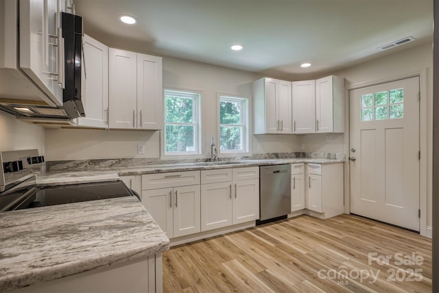 835 Vine Arden Rd, Morganton, NC 28655 - kitchen featuring appliances with stainless steel finishes, light wood-style flooring, white cabinets, recessed lighting, and light stone counters